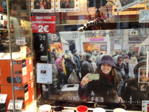 There I am on the TV peeking into an electronics store